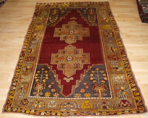 Antique Turkish Maden Region Rug, Double Medallion, Red Ground, Circa 1900.