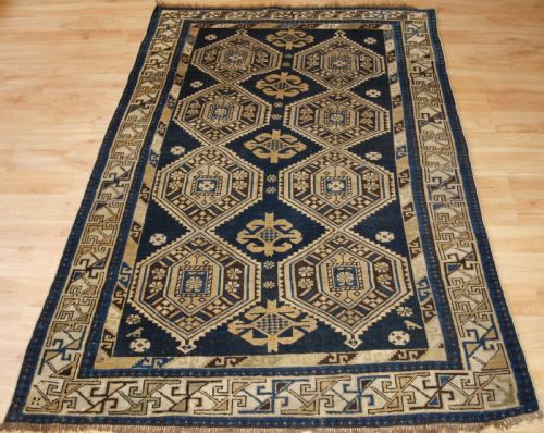 Antique Caucasian Shirvan Rug with Soft Faded Colours, Circa 1900.