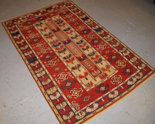 fig 1. ANTIQUE TURKISH MILAS VILLAGE RUG OF SCARCE DESIGN, CIRCA 1850.