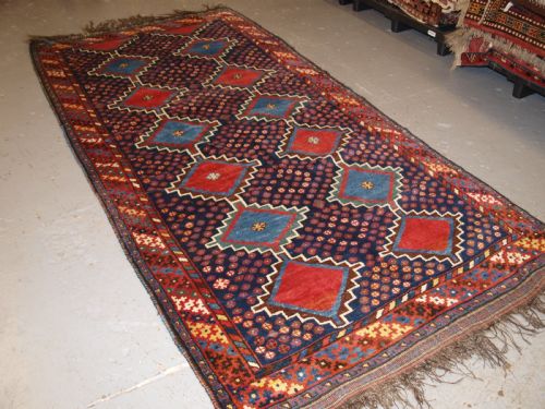 fig 1. ANTIQUE LURI TRIBAL LONG RUG, BOLD DESIGN AND COLOUR, CIRCA 1900/20.