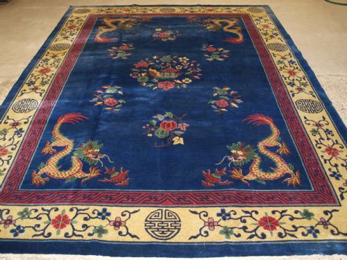 fig 1. ANTIQUE CHINESE PEKING CARPET WITH FOUR DRAGONS, CIRCA 1920.