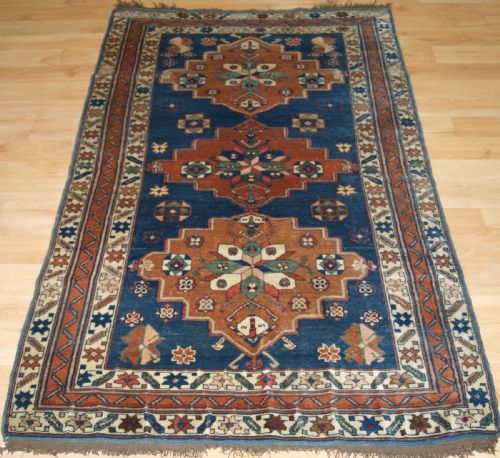 Antique Caucasian Derbent Triple Medallion Rug, Circa 1900.