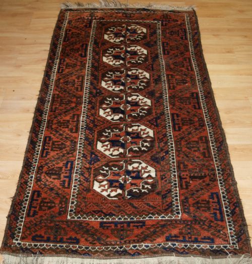 Antique Mahdad Khani Baluch Rug, Large Turkmen Guls, Circa 1900.