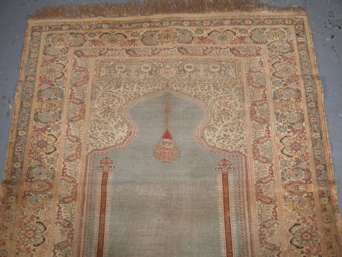 fig 1. ANTIQUE TURKISH GHIORDES PRAYER RUG, LIGHT BLUE FIELD, CIRCA 1825-1850.