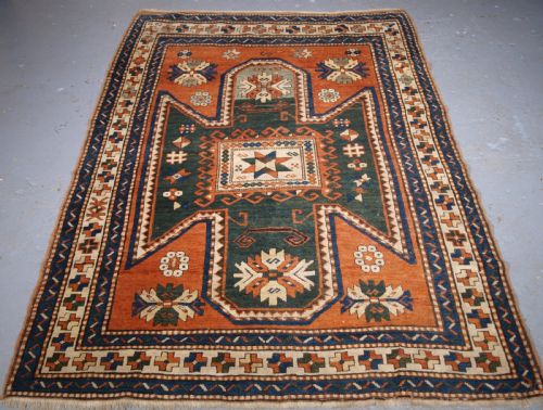 Antique Caucasian Sewan Kazak Rug with Green Ground Medallion, Circa 1890.