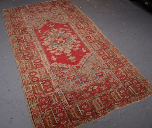 fig 1. ANTIQUE TURKISH GHIORDES RUG, SOFT COLOURS, LATE 18TH / EARLY 19TH CENTURY.