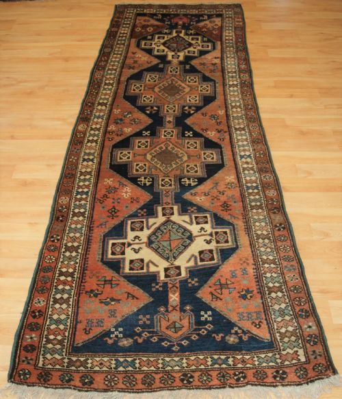 Antique Kurdish Runner with Rustic Charm, Circa 1900.