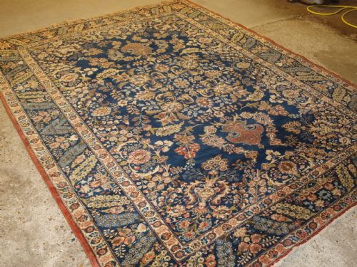 Old Tabriz Carpet with Large Scale Floral Design, Circa 1920.
