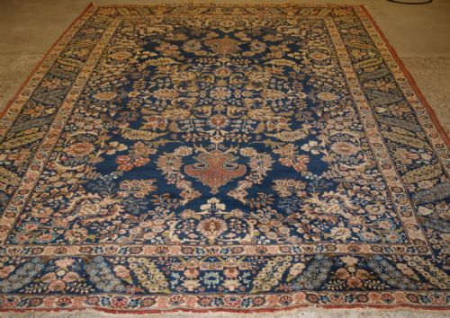 fig 1. OLD TABRIZ CARPET WITH LARGE SCALE FLORAL DESIGN, CIRCA 1920.