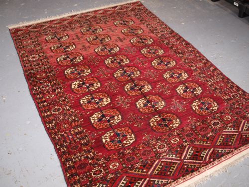 fig 1. ANTIQUE TEKKE TURKMEN RUG, SOFT MADDER RED COLOUR, CIRCA 1900.