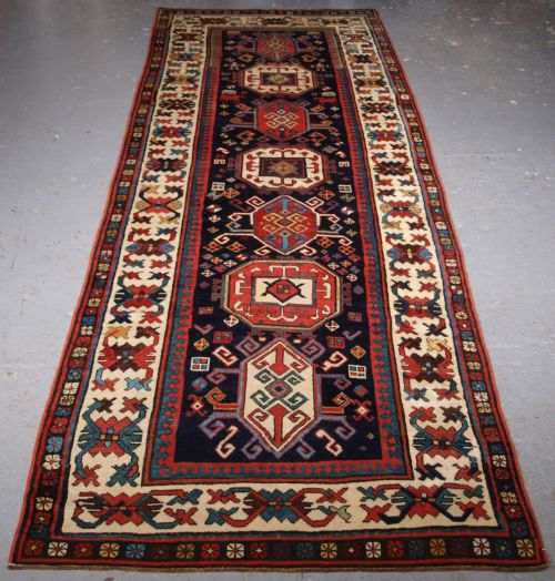 Antique Caucasian Gendje Kazak Runner with Medallion Design, Circa 1890.
