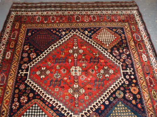 fig 1. ANTIQUE KELLEH LONG RUG BY THE LURI TRIBE, CLASSIC MEDALLION DESIGN, CIRCA 1900.