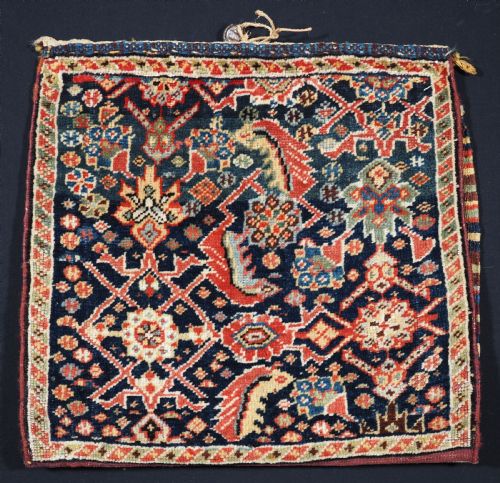 fig 1. ANTIQUE TRIBAL QASHQAI BAG, HERATI DESIGN WITH STRIPED PLAIN WEAVE BACK, CIRCA 1880.