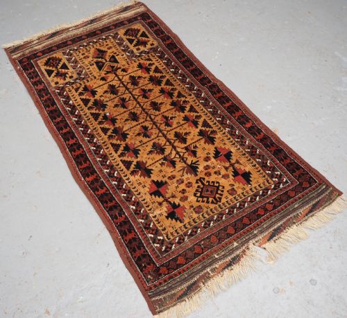 fig 1. ANTIQUE SARAKH BALUCH PRAYER RUG, CAMEL GROUND TREE OF LIFE, CIRCA 1880.