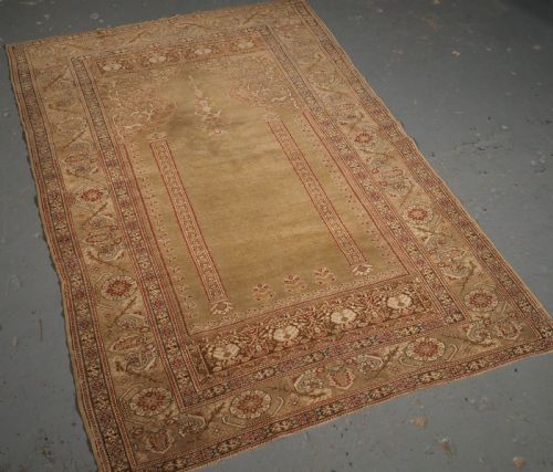 fig 1. ANTIQUE TURKISH GHIORDES PRAYER RUG, GREEN GROUND, EARLY 19TH CENTURY.
