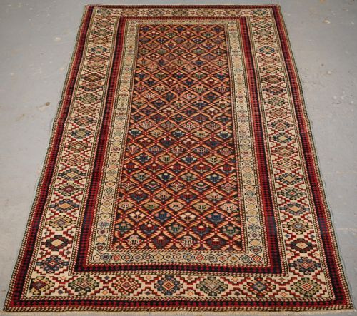 Antique Caucasian Kuba Shirvan Rug of Floral Lattice Design, Circa 1880.
