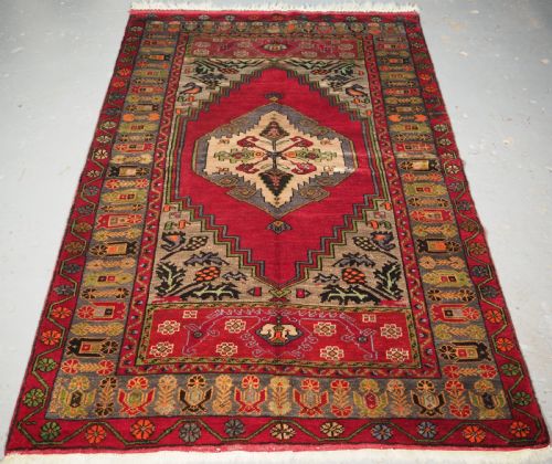 Old Central Anatolian Turkish Village Rug, Single Medallion, Circa 1930.
