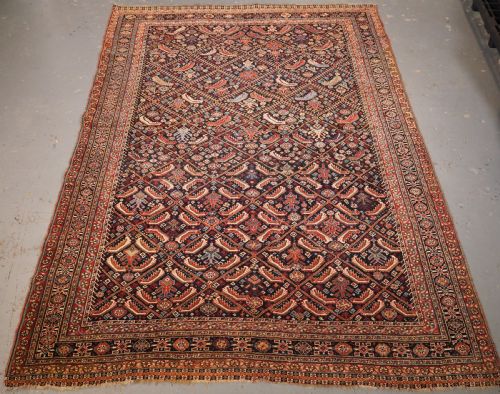 Antique Tribal Qashqai Rug with Herati Lattice Design, Circa 1880.