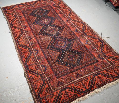 fig 1. ANTIQUE FERDOWS BALUCH RUG OF SCARCE DESIGN, CIRCA 1900.