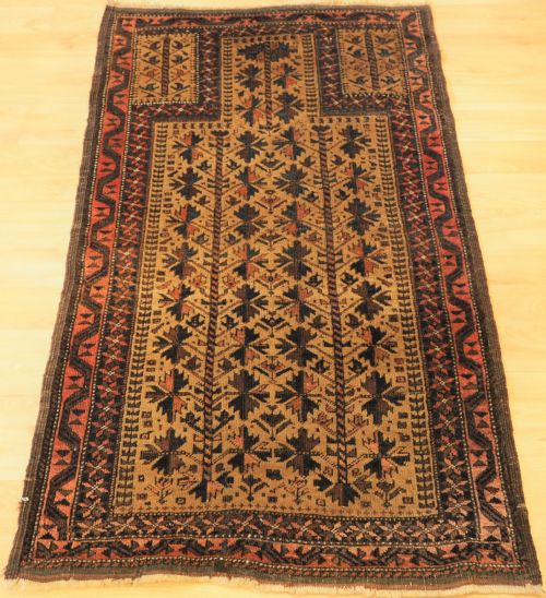 Antique Baluch Prayer Rug with Tree of Life Design on a Camel Ground, Circa 1900.