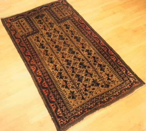 fig 1. ANTIQUE BALUCH PRAYER RUG WITH TREE OF LIFE DESIGN ON A CAMEL GROUND, CIRCA 1900.
