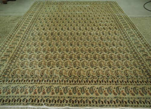 fig 1. ANTIQUE KASHAN CARPET, IVORY GROUND WITH ALL OVER BOTEH DESIGN, CIRCA 1920.