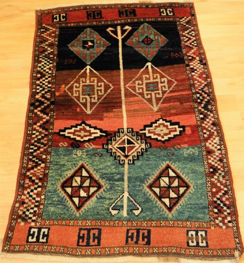 ANTIQUE TURKISH YURUK RUG OF SMLL SIZE AND CHARMING DESIGN CIRCA 1900