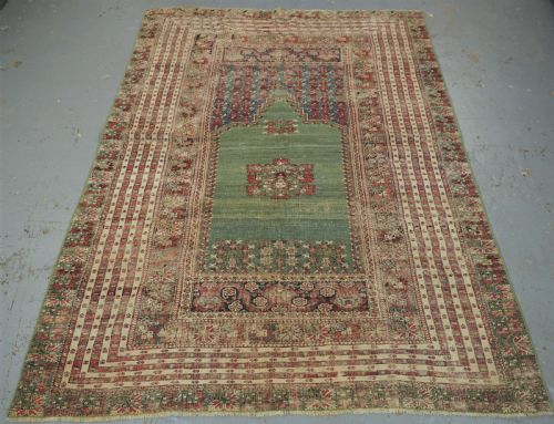 Antique Turkish Ghiordes Prayer Rug, Multiple Borders, Green Field, Circa 1750.