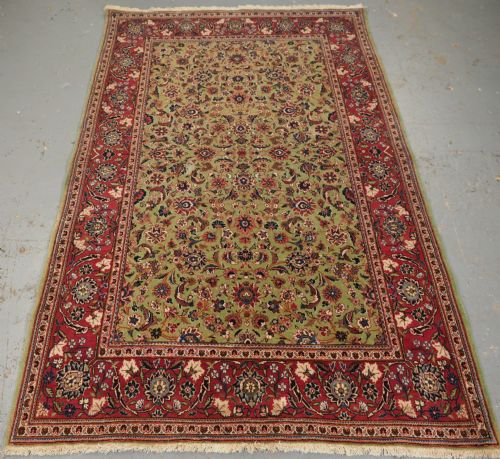 Antique Kashan Rug with Fine Floral Design on a Scarce Green Ground, Circa 1900.