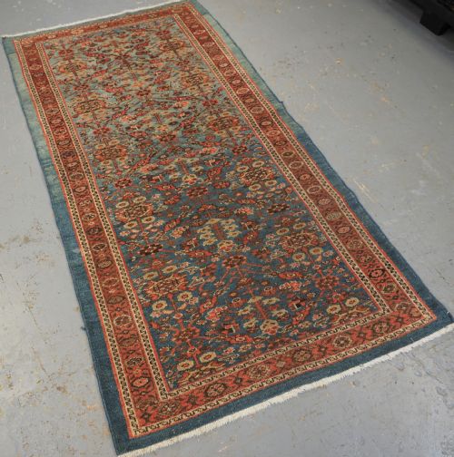 fig 1. ANTIQUE ZIEGLER RUG WITH SHRUB DESIGN, POWDER BLUE GROUND, CIRCA 1890.