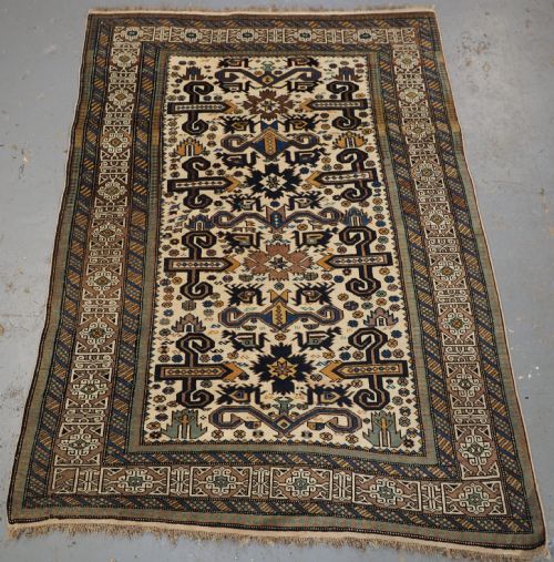 Antique Caucasian Kuba Region White Ground Perepedil Rug, Circa 1890.