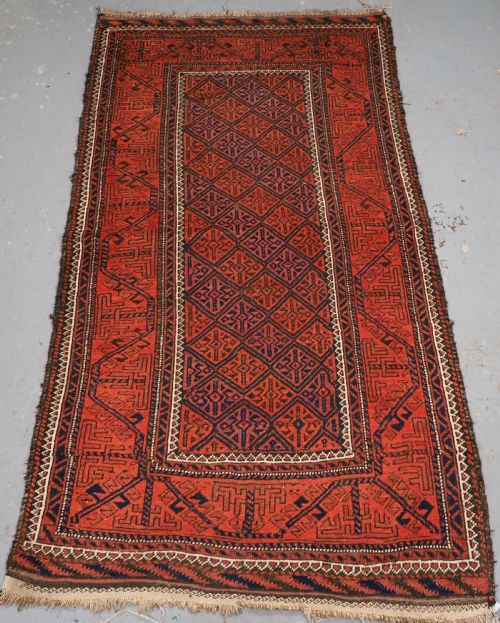 Antique Afghan Baluch Rug with Lattice Design, Circa 1900.