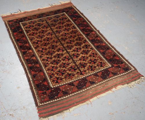 fig 1. ANTIQUE BALUCH RUG; POSSIBLY TIMURI TRIBES, CAMEL GROUND WITH TREE OF LIFE. CIRCA 1880.