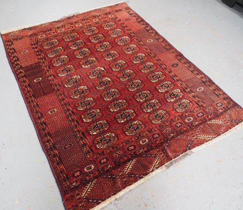 fig 1. ANTIQUE TEKKE TURKMEN RUG WITH WARM RED COLOUR, CIRCA 1900.