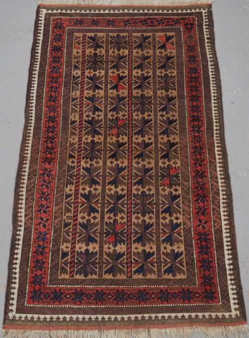 Antique Baluch Rug with Repeat Lotus Leaf Design, Circa 1900.