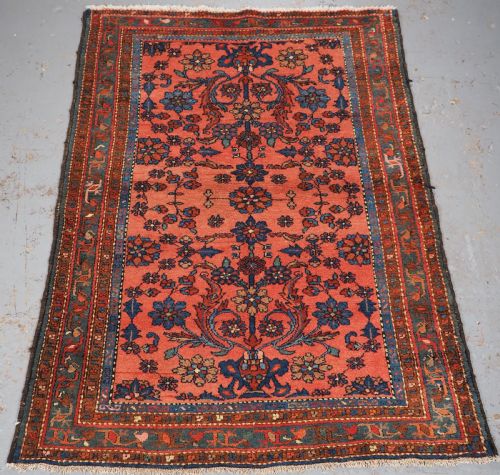 Antique Hamadan Rug with Floral Vase Design, Circa 1920.