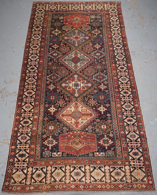 Antique Caucasian Shirvan Rug, Superb Design with Kufic Border, Circa 1880.