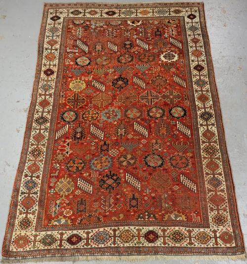 Antique Tribal Shekarlu Qashqai Rug with Red Ground, Circa 1880.