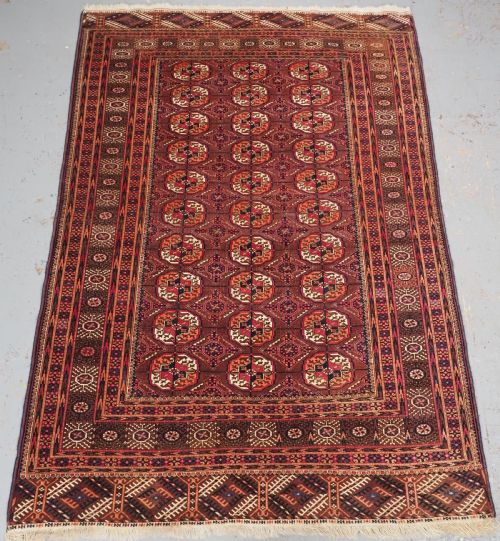 Antique Tekke Turkmen Rug, Cochineal Dye Highlights, Circa 1900.