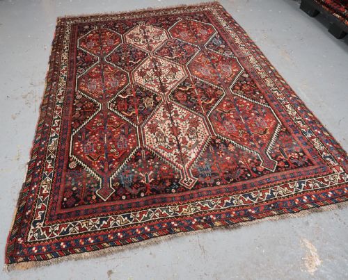 fig 1. ANTIQUE TRIBAL KHAMSEH RUG WITH BIRD MEDALLION DESIGN, CIRCA 1900.