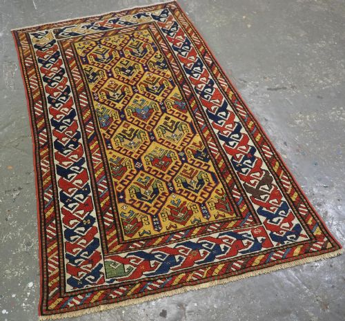 ANTIQUE CAUCASIAN DAGESTAN RUG WITH LATTICE DESIGN ON A YELLOW GROUND CIRCA 1890 - ADDITIONAL PHOTO 1
