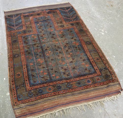 fig 1. ANTIQUE BALUCH OR TIMURI BLUE GROUND PRAYER RUG, CIRCA 1880.