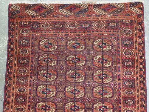 fig 1. ANTIQUE TEKKE TURKMEN DOWRY RUG, COCHINEAL DYE THROUGH OUT, CIRCA 1900.