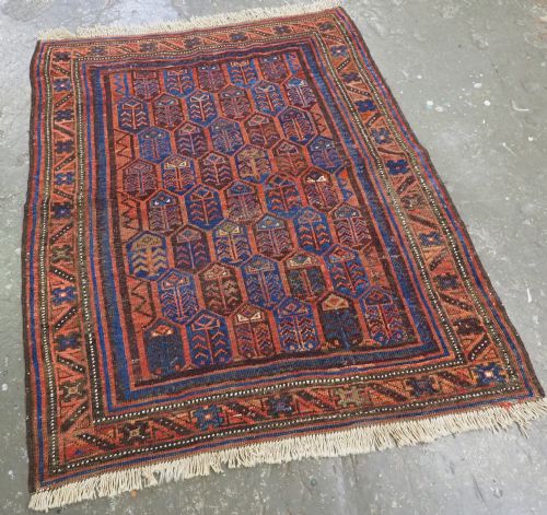 fig 1. ANTIQUE TIMURI / BALUCH RUG WITH SHRUB DESIGN, WESTERN AFGHANISTAN, CIRCA 1880.