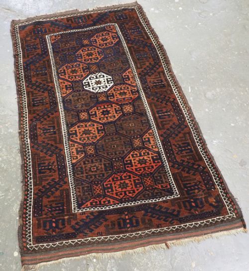 fig 1. ANTIQUE KHORASAN BALUCH RUG, OUTSTANDING DESIGN, CIRCA 1900.