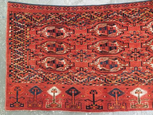 fig 1. ANTIQUE ERSARI KIZIL AYAK TURKMEN CHUVAL FACE, LARGE TURKMEN TREE ELEM, CIRCA 1900.