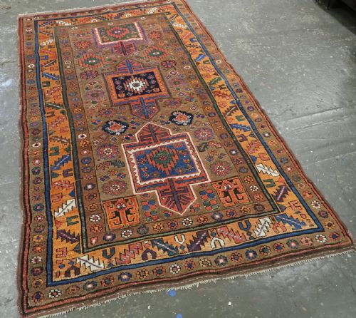 fig 1. ANTIQUE KURDISH SAUJ BULAGH RUG, CAMEL GROUND, CIRCA 1880.