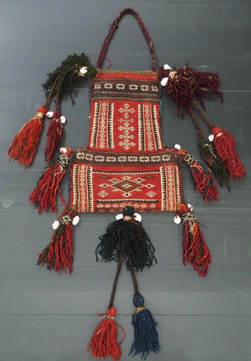 ANTIQUE SALT BAG (NAMAKDAN) BY THE ZAGGAR MENGAL BALUCH NOMADS, CIRCA 1900.