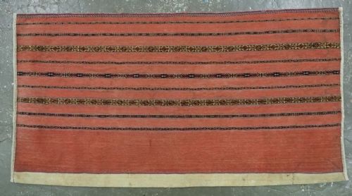 fig 2. A pair of rectangular antique Turkmen Kizil chuval woven textiles in terracotta red with thin horizontal geometric bands and cream backing edges.