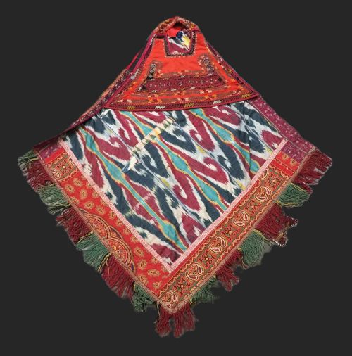 A Rare Uzbek Karakalpak Ladies Embroidered Wedding Veil with Silk Ikat Back, 19th Century.